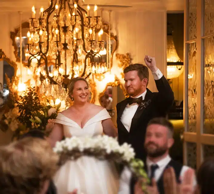 Bride and Groom Traditional Wedding Entrance Vintage Crystal Chandelier Gold Luxury The Orangery Party Jaspers Berry