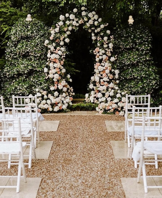 Floral Arch Ceremony Courtyard Chiavari Chairs Jaspers Berry South Coast NSW