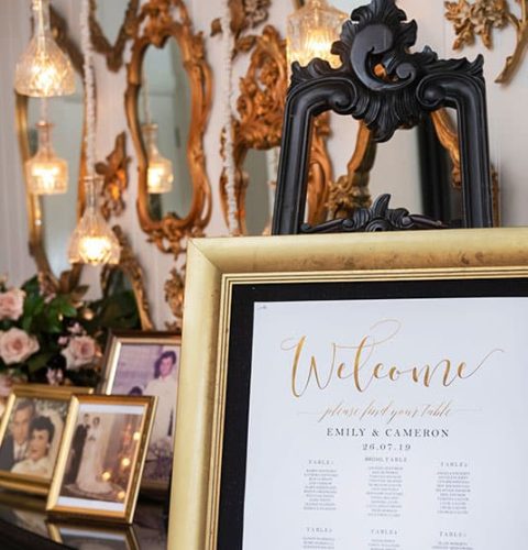 Welcome-Sign-Seating-Plan-Marble-Foyer-Memorabilia-Family-Photos-Jaspers-Berry